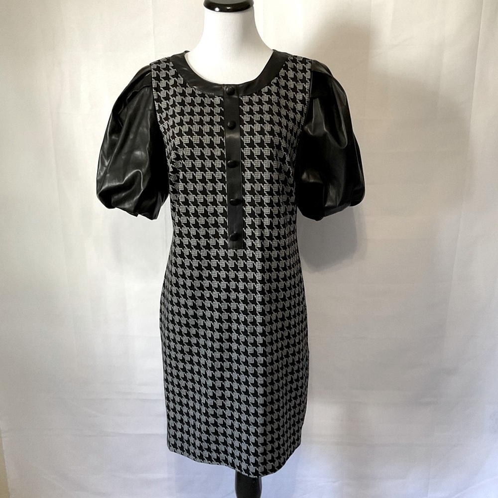 New York & Company houndstooth dress with faux leather puff sleeves and pockets.